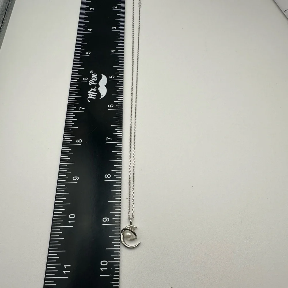 Elegant Silver Moon and Pearl Planet Pendant Necklace - Picture 4 of 7
